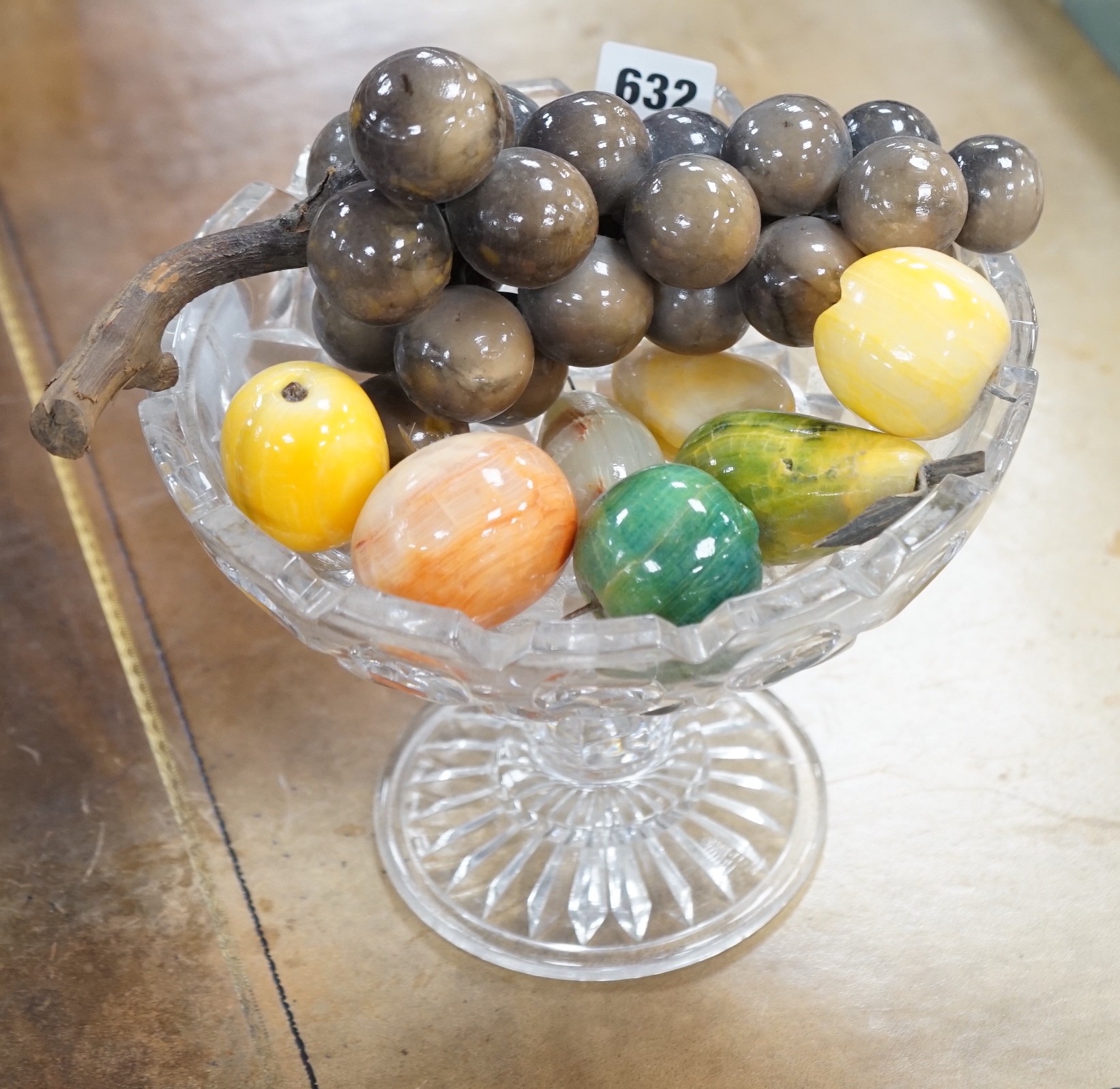 A collection of polished stone fruits